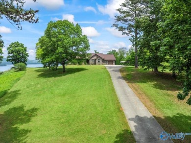 On the northern side of prestigious Buck Island, you'll find on Gunters Landing in Alabama - for sale on GolfHomes.com, golf home, golf lot