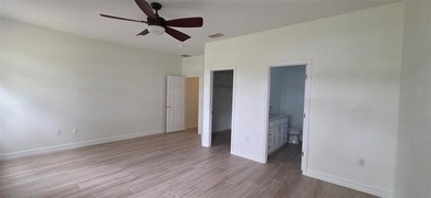 Exceptional residence in the prestigious gated community of on Eagle Creek Golf Club in Florida - for sale on GolfHomes.com, golf home, golf lot