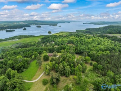 Majestic views of the Tennessee River, Lake Guntersville await on Gunters Landing in Alabama - for sale on GolfHomes.com, golf home, golf lot