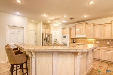 Welcome to 13th Fairway that hosts a beautifully appointed on Rockport Country Club in Texas - for sale on GolfHomes.com, golf home, golf lot