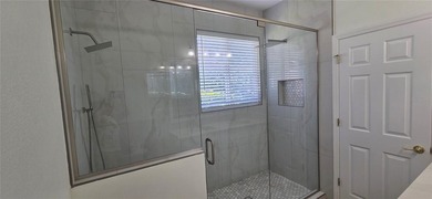 Exceptional residence in the prestigious gated community of on Eagle Creek Golf Club in Florida - for sale on GolfHomes.com, golf home, golf lot