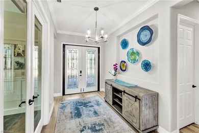 Priced to sell and positioned as one of the most upgraded homes on Bonita National Golf Course in Florida - for sale on GolfHomes.com, golf home, golf lot