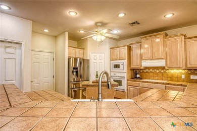 Welcome to 13th Fairway that hosts a beautifully appointed on Rockport Country Club in Texas - for sale on GolfHomes.com, golf home, golf lot