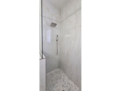 Exceptional residence in the prestigious gated community of on Eagle Creek Golf Club in Florida - for sale on GolfHomes.com, golf home, golf lot