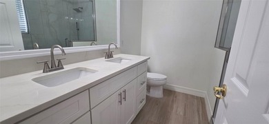 Exceptional residence in the prestigious gated community of on Eagle Creek Golf Club in Florida - for sale on GolfHomes.com, golf home, golf lot