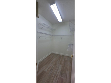 Exceptional residence in the prestigious gated community of on Eagle Creek Golf Club in Florida - for sale on GolfHomes.com, golf home, golf lot