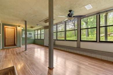 Charming Home, Lake Views & Versatile Living Spaces. Near the on Bella Vista Country Club - Highlands in Arkansas - for sale on GolfHomes.com, golf home, golf lot