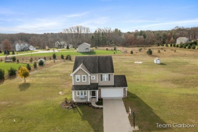 Rare find! Newer built home on 2 acres in popular Caledonia on Saskatoon Golf Club in Michigan - for sale on GolfHomes.com, golf home, golf lot