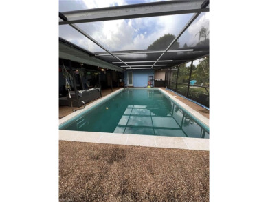 Welcome to your dream home at 6765 Overlook Drive, nestled in on Cypress Lake Country Club in Florida - for sale on GolfHomes.com, golf home, golf lot
