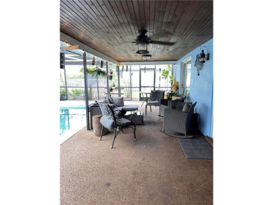 Welcome to your dream home at 6765 Overlook Drive, nestled in on Cypress Lake Country Club in Florida - for sale on GolfHomes.com, golf home, golf lot