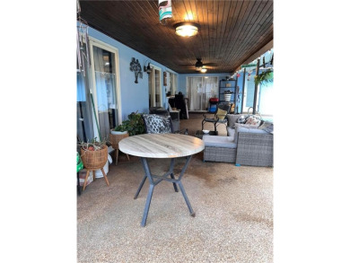 Welcome to your dream home at 6765 Overlook Drive, nestled in on Cypress Lake Country Club in Florida - for sale on GolfHomes.com, golf home, golf lot