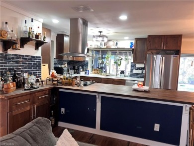 Welcome to your dream home at 6765 Overlook Drive, nestled in on Cypress Lake Country Club in Florida - for sale on GolfHomes.com, golf home, golf lot