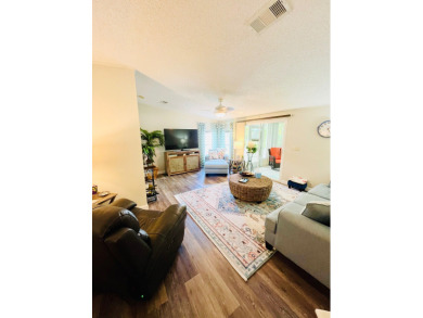 Experience the perfect coastal feel in this beautiful on Pine Lakes Country Club in Florida - for sale on GolfHomes.com, golf home, golf lot