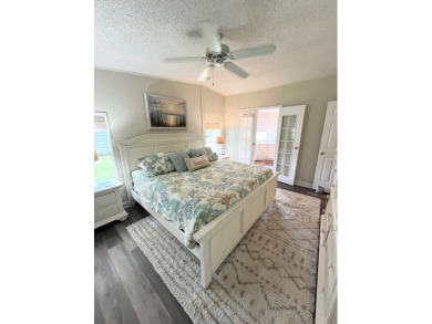 Experience the perfect coastal feel in this beautiful on Pine Lakes Country Club in Florida - for sale on GolfHomes.com, golf home, golf lot