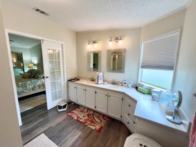Experience the perfect coastal feel in this beautiful on Pine Lakes Country Club in Florida - for sale on GolfHomes.com, golf home, golf lot