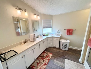 Experience the perfect coastal feel in this beautiful on Pine Lakes Country Club in Florida - for sale on GolfHomes.com, golf home, golf lot