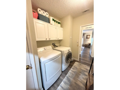 Experience the perfect coastal feel in this beautiful on Pine Lakes Country Club in Florida - for sale on GolfHomes.com, golf home, golf lot