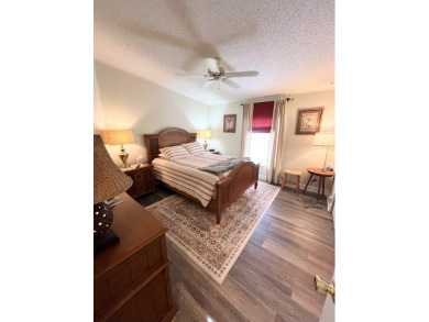 Experience the perfect coastal feel in this beautiful on Pine Lakes Country Club in Florida - for sale on GolfHomes.com, golf home, golf lot