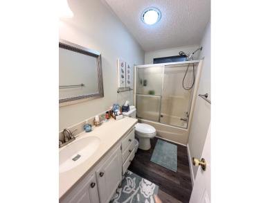 Experience the perfect coastal feel in this beautiful on Pine Lakes Country Club in Florida - for sale on GolfHomes.com, golf home, golf lot