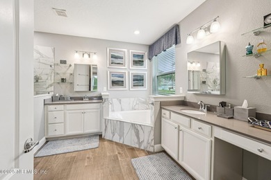 Luxury Living in Palencia, Pond-front Perfection! Welcome to on The Palencia Club in Florida - for sale on GolfHomes.com, golf home, golf lot