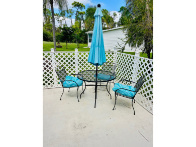 Experience the perfect coastal feel in this beautiful on Pine Lakes Country Club in Florida - for sale on GolfHomes.com, golf home, golf lot