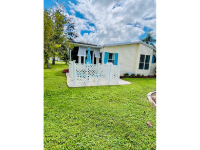 Experience the perfect coastal feel in this beautiful on Pine Lakes Country Club in Florida - for sale on GolfHomes.com, golf home, golf lot
