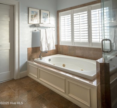 Absolutely magical home overlooking Landfall's largest lake, the on Country Club of Landfall in North Carolina - for sale on GolfHomes.com, golf home, golf lot