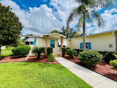 Experience the perfect coastal feel in this beautiful on Pine Lakes Country Club in Florida - for sale on GolfHomes.com, golf home, golf lot