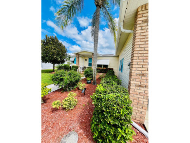 Experience the perfect coastal feel in this beautiful on Pine Lakes Country Club in Florida - for sale on GolfHomes.com, golf home, golf lot
