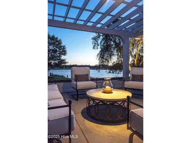 Absolutely magical home overlooking Landfall's largest lake, the on Country Club of Landfall in North Carolina - for sale on GolfHomes.com, golf home, golf lot