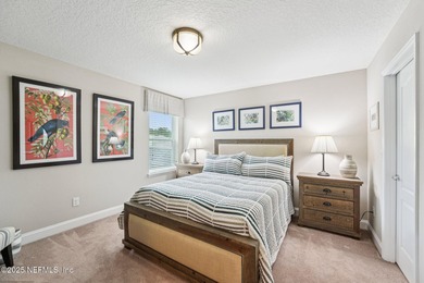 Luxury Living in Palencia, Pond-front Perfection! Welcome to on The Palencia Club in Florida - for sale on GolfHomes.com, golf home, golf lot