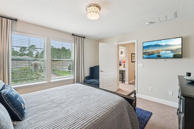 Luxury Living in Palencia, Pond-front Perfection! Welcome to on The Palencia Club in Florida - for sale on GolfHomes.com, golf home, golf lot