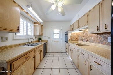 This charming, spacious 2-bedroom, 2-bath home features on Sun City Country Club in Arizona - for sale on GolfHomes.com, golf home, golf lot