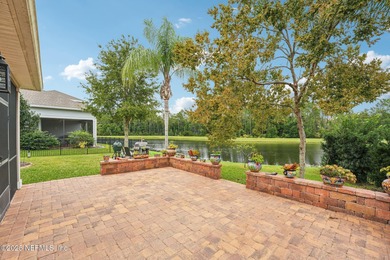 Luxury Living in Palencia, Pond-front Perfection! Welcome to on The Palencia Club in Florida - for sale on GolfHomes.com, golf home, golf lot