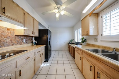 This charming, spacious 2-bedroom, 2-bath home features on Sun City Country Club in Arizona - for sale on GolfHomes.com, golf home, golf lot