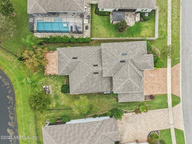 Luxury Living in Palencia, Pond-front Perfection! Welcome to on The Palencia Club in Florida - for sale on GolfHomes.com, golf home, golf lot