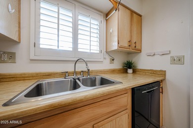 This charming, spacious 2-bedroom, 2-bath home features on Sun City Country Club in Arizona - for sale on GolfHomes.com, golf home, golf lot