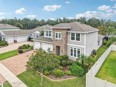 Luxury Living in Palencia, Pond-front Perfection! Welcome to on The Palencia Club in Florida - for sale on GolfHomes.com, golf home, golf lot