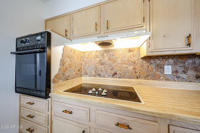 This charming, spacious 2-bedroom, 2-bath home features on Sun City Country Club in Arizona - for sale on GolfHomes.com, golf home, golf lot