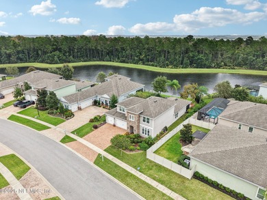 Luxury Living in Palencia, Pond-front Perfection! Welcome to on The Palencia Club in Florida - for sale on GolfHomes.com, golf home, golf lot