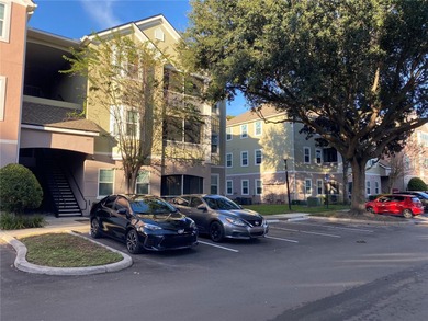 Welcome to this spacious and bright 2-bedroom, 2-bathroom condo on MetroWest Golf Club in Florida - for sale on GolfHomes.com, golf home, golf lot
