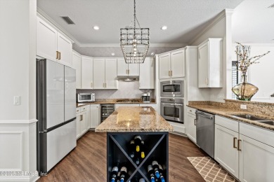 Welcome to this beautifully crafted Estaurio courtyard home by on Jacksonville Golf and Country Club in Florida - for sale on GolfHomes.com, golf home, golf lot