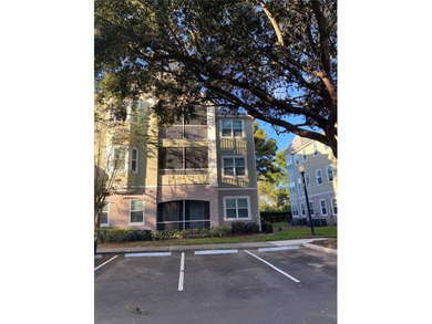 Welcome to this spacious and bright 2-bedroom, 2-bathroom condo on MetroWest Golf Club in Florida - for sale on GolfHomes.com, golf home, golf lot