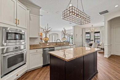 Welcome to this beautifully crafted Estaurio courtyard home by on Jacksonville Golf and Country Club in Florida - for sale on GolfHomes.com, golf home, golf lot
