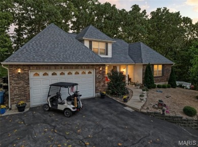 WOW! This beautifully built home on the 13th hole of Raintree on Raintree Country Club in Missouri - for sale on GolfHomes.com, golf home, golf lot