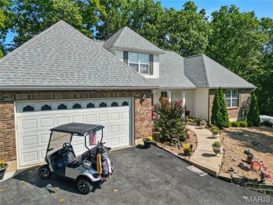 WOW! This beautifully built home on the 13th hole of Raintree on Raintree Country Club in Missouri - for sale on GolfHomes.com, golf home, golf lot