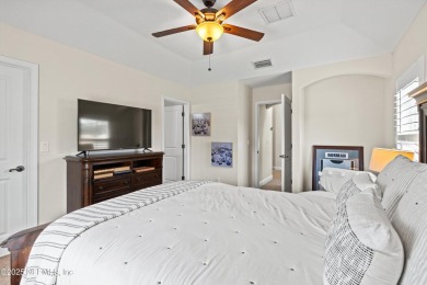 Welcome to this beautifully crafted Estaurio courtyard home by on Jacksonville Golf and Country Club in Florida - for sale on GolfHomes.com, golf home, golf lot