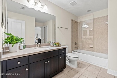 Welcome to this beautifully crafted Estaurio courtyard home by on Jacksonville Golf and Country Club in Florida - for sale on GolfHomes.com, golf home, golf lot