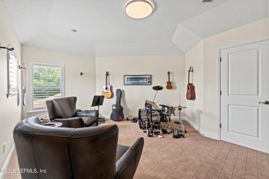 Welcome to this beautifully crafted Estaurio courtyard home by on Jacksonville Golf and Country Club in Florida - for sale on GolfHomes.com, golf home, golf lot