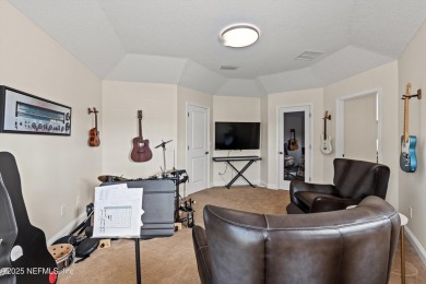 Welcome to this beautifully crafted Estaurio courtyard home by on Jacksonville Golf and Country Club in Florida - for sale on GolfHomes.com, golf home, golf lot